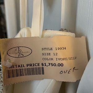 Women’s size 12 wedding dress. New never worn. Tags still on